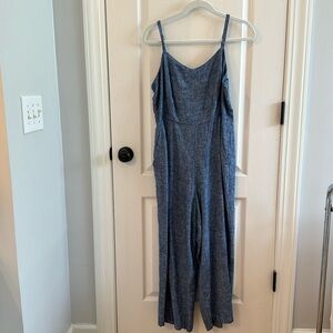 Large, denim jumpsuit cropped